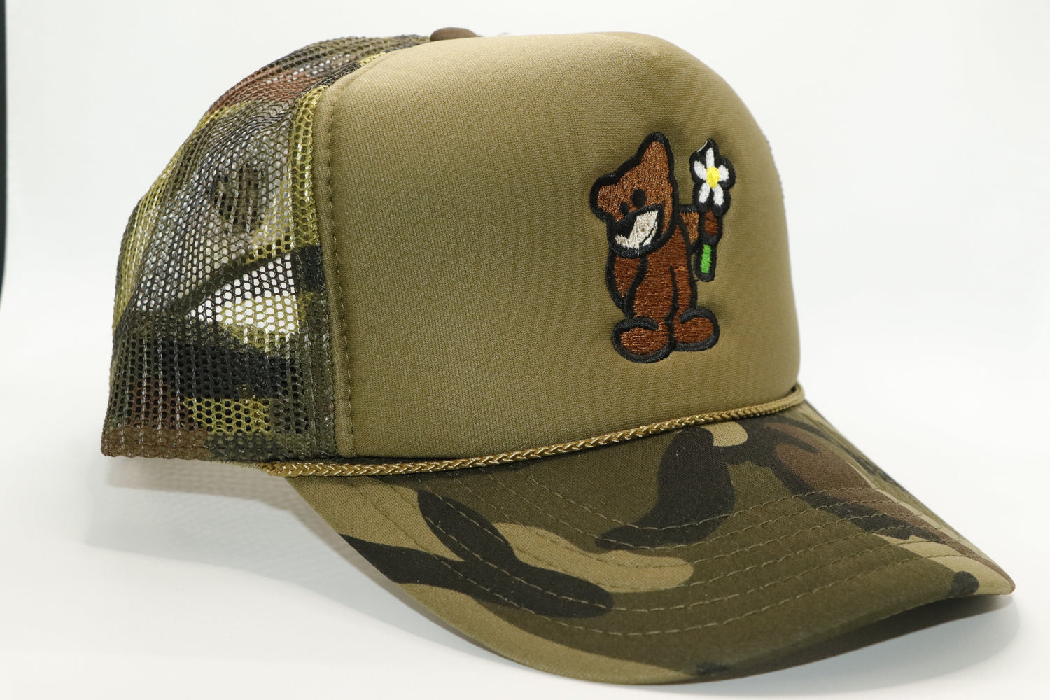 Green Front Panel, Camo brim with Camo back, and Brown Bear holding a Magnolia Daisy